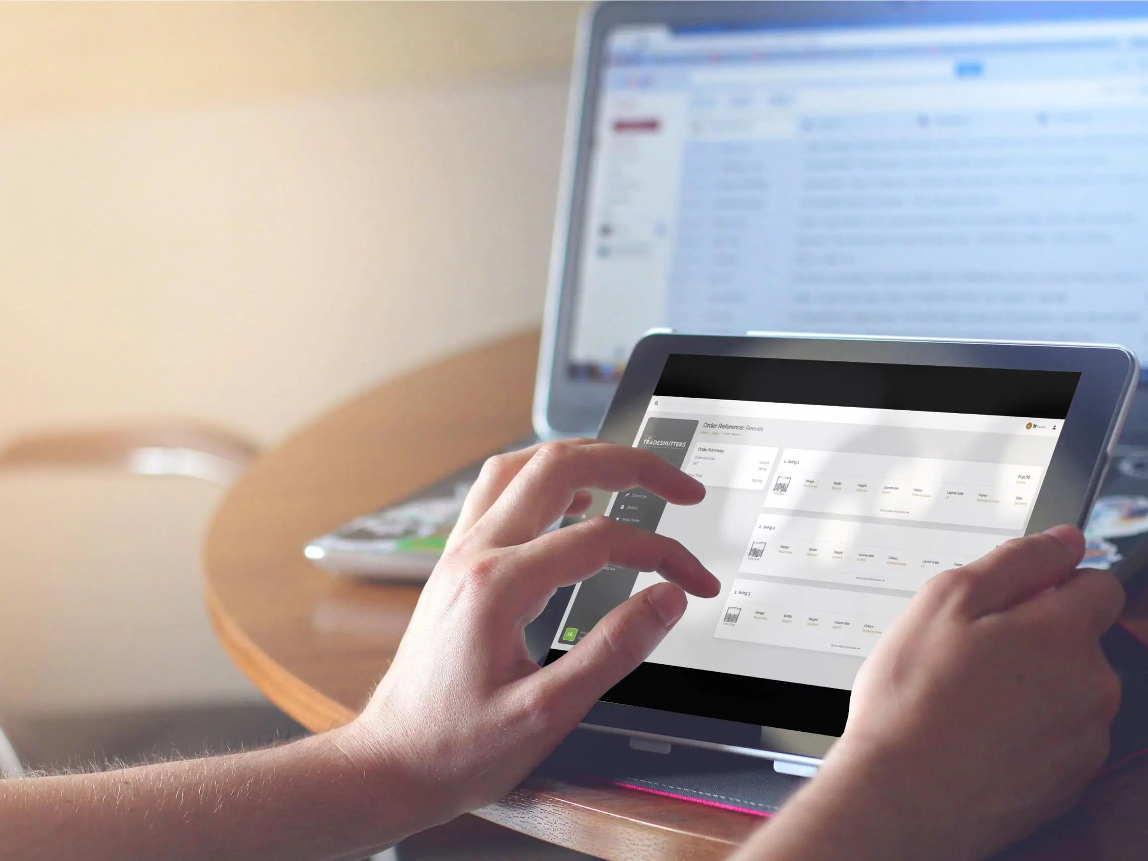 hands typing on tablet