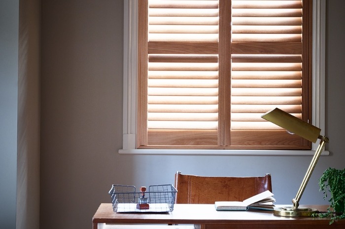 wooden shutters in home office