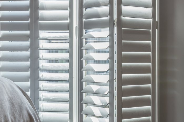 white shutters half open