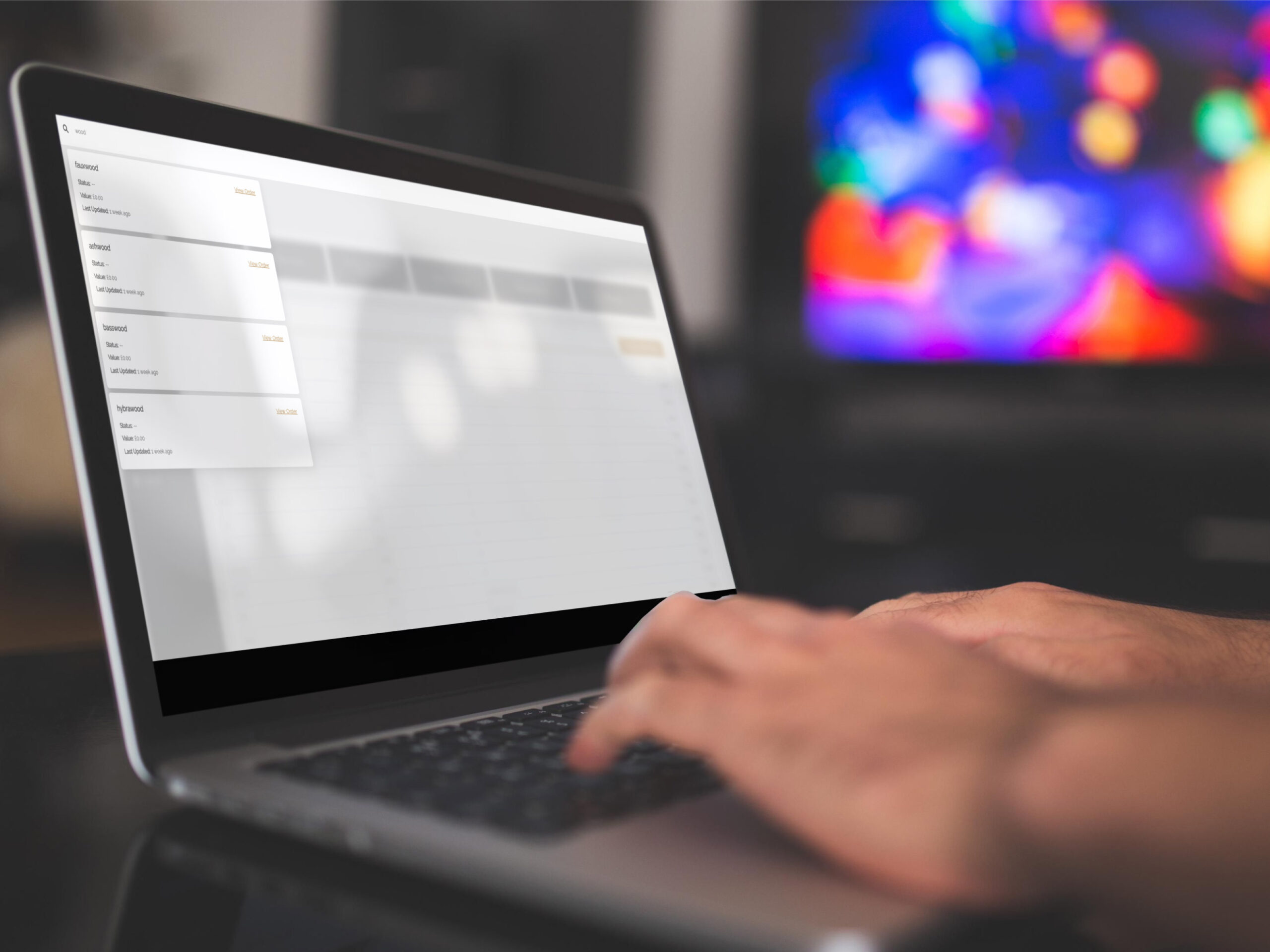 hands typing on laptop